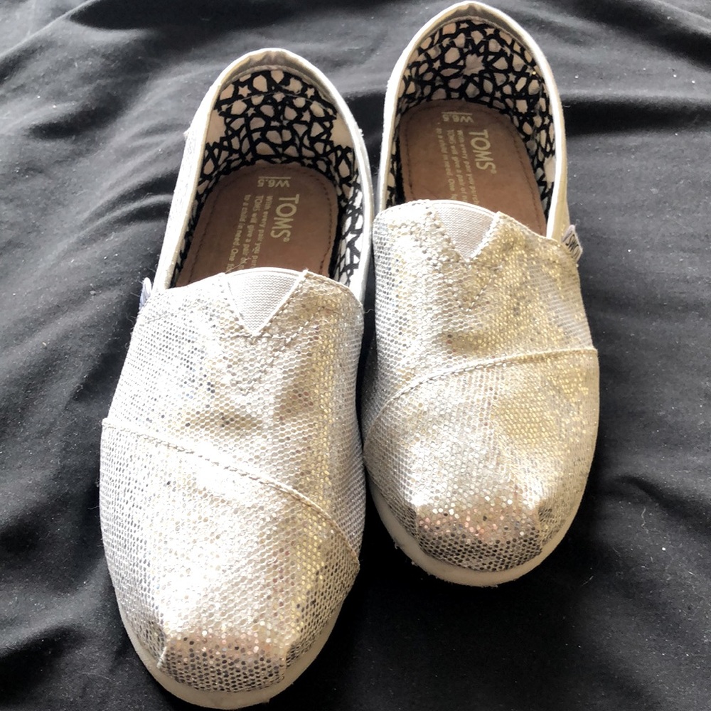 Brand new never worn silver TOMS